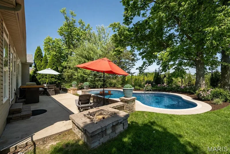 AI-enhanced image to illustrate potential for swimming pool. — 233 Fox Haven Drive, O'Fallon, MO 63368