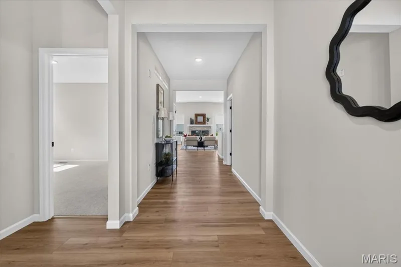 The spacious entrance foyer offers an elegant arrival with plenty of room to greet guests while setting the tone for the home's stylish design and functional layout. — 86 River Wind Drive, St Charles, MO 63301