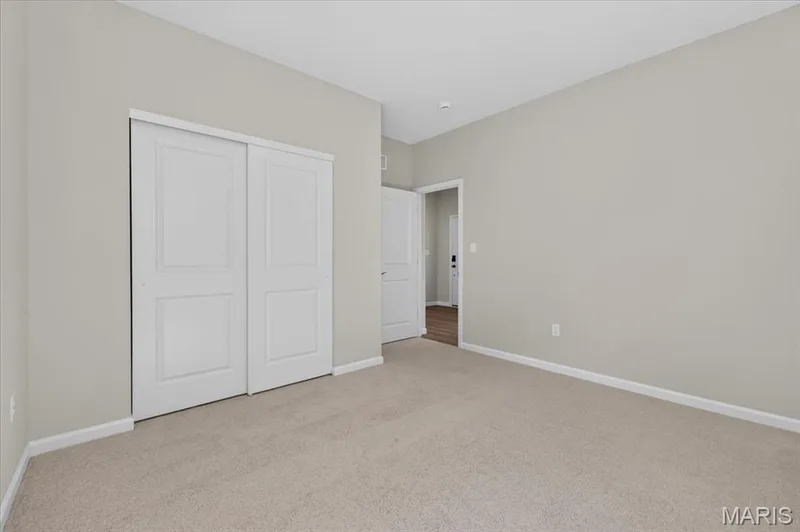 Whether you're accommodating a growing family or welcoming overnight guests, the spacious secondary bedrooms offer comfort, functionality, and ample storage with well-sized closets and bright, airy interiors. — 86 River Wind Drive, St Charles, MO 63301