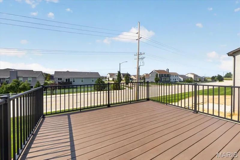 Step outside to the spacious composite deck, the perfect extension of your living space. Whether you're enjoying your morning coffee, grilling with friends, or relaxing at the end of the day, this low-maintenance outdoor retreat is ideal for entertaining and taking in the surrounding views. — 86 River Wind Drive, St Charles, MO 63301
