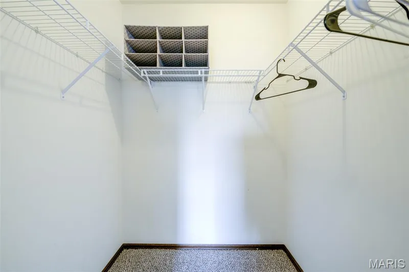 One of the primary bedroom closets is a walk-in closet. — 1647 Chapman Court, St Charles, MO 63303
