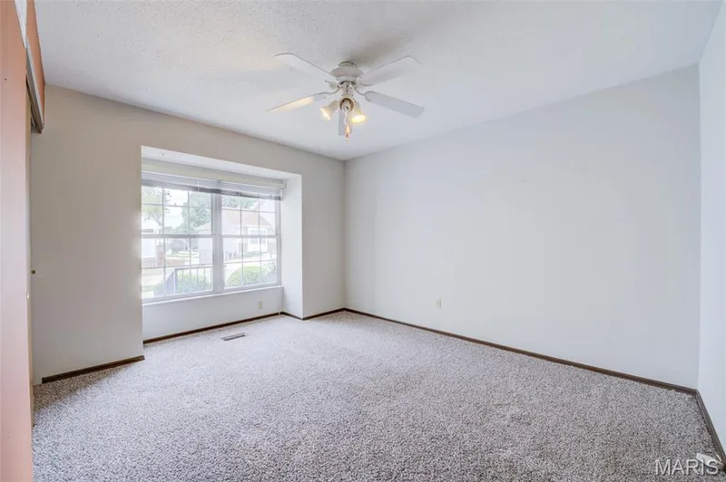 The front bedroom has a bay window. — 1647 Chapman Court, St Charles, MO 63303