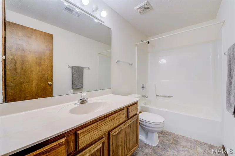 There is also a full 3rd bathroom in the lower level! — 1647 Chapman Court, St Charles, MO 63303