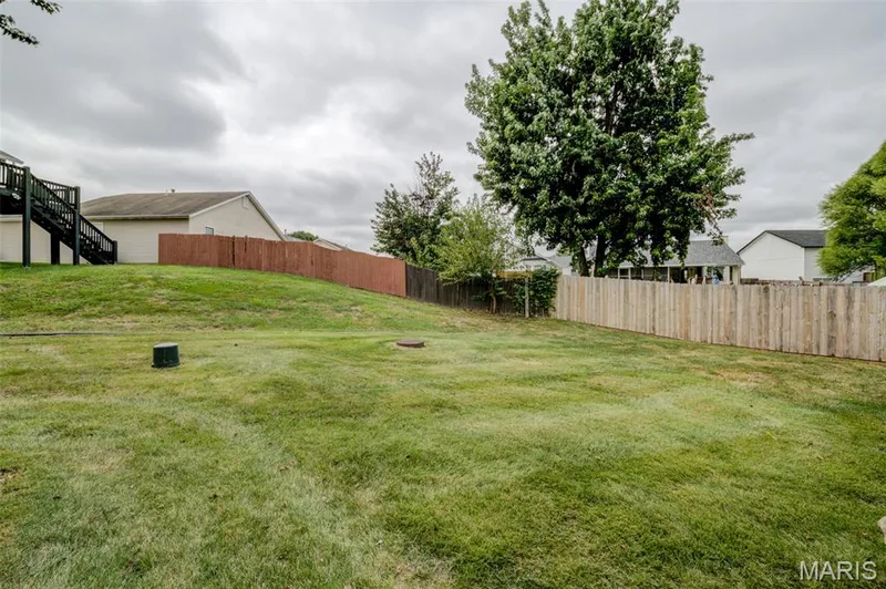 The yard behind the home. — 1647 Chapman Court, St Charles, MO 63303