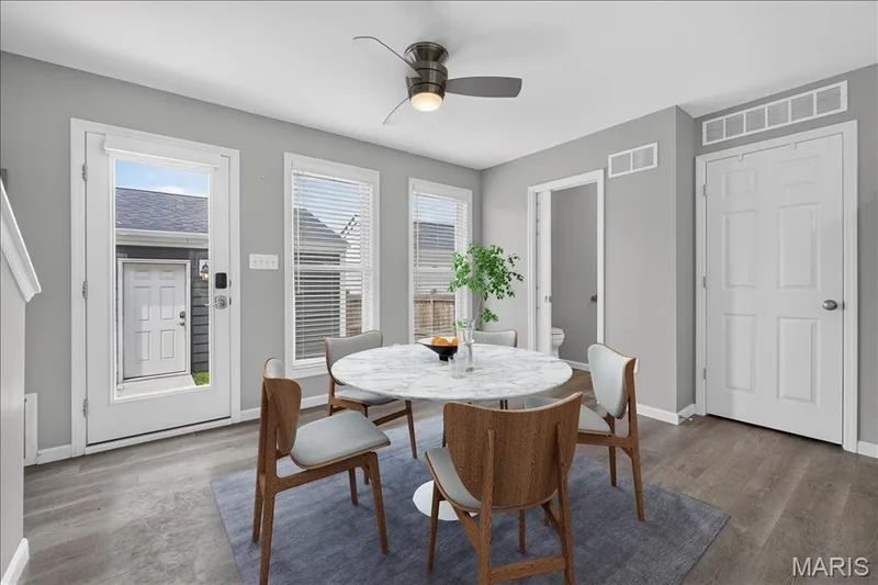 Breakfast area with access to the back courtyard — 208 Freehold Rock Way, St Charles, MO 63301