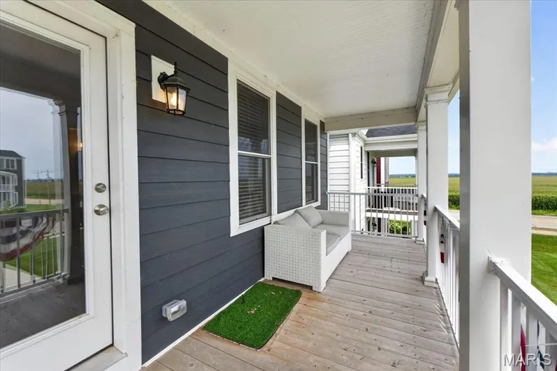 Balcony access from the primary bedroom — 208 Freehold Rock Way, St Charles, MO 63301