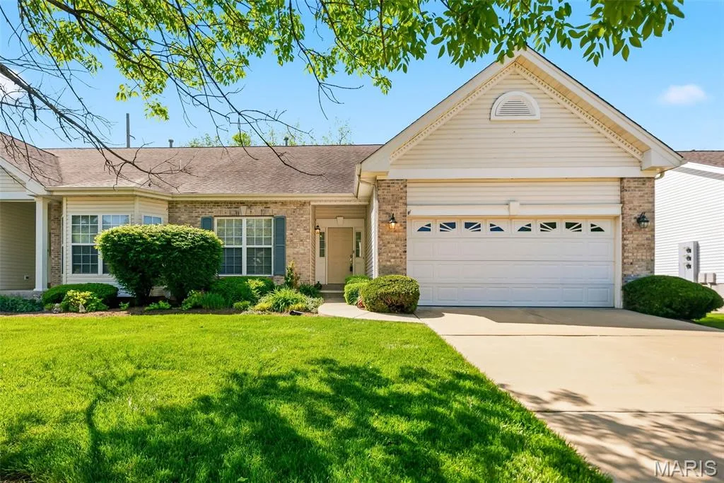 Front of Villa with 2-car garage — 1311 Pine Bluff Drive, St Charles, MO 63304