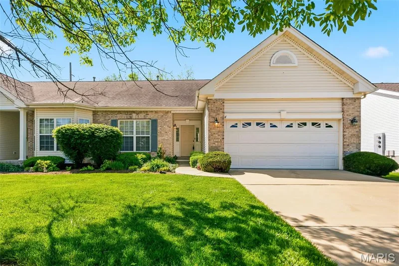 Front of Villa with 2-car garage — 1311 Pine Bluff Drive, St Charles, MO 63304