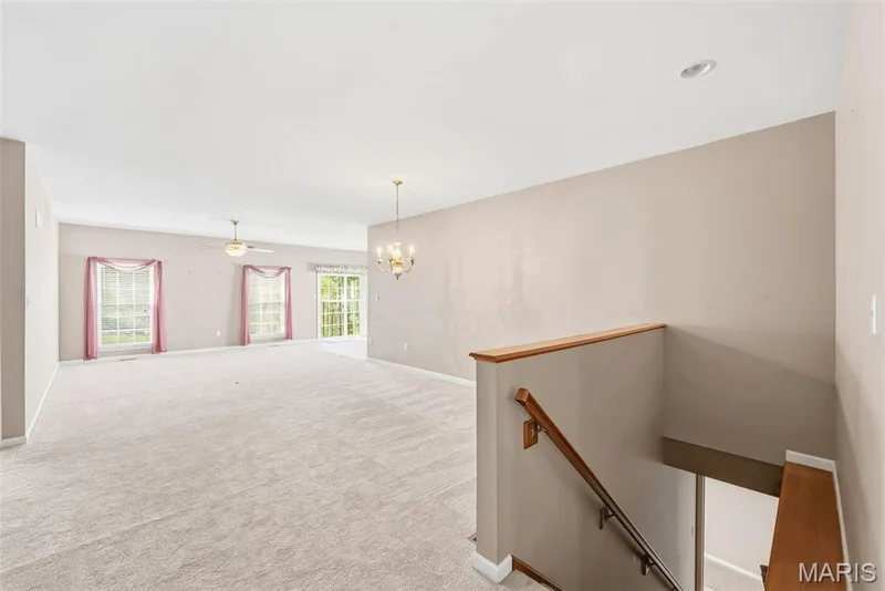View from foyer of oversized Dining and Living room combo — 1311 Pine Bluff Drive, St Charles, MO 63304