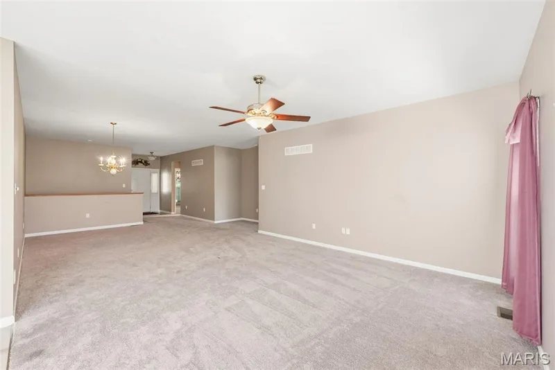 View from Breakfast room into Dining/Living room — 1311 Pine Bluff Drive, St Charles, MO 63304