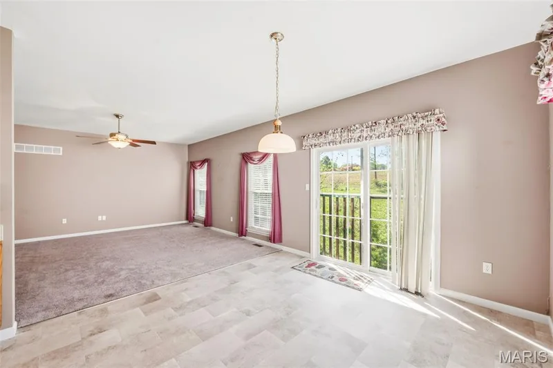 Breakfast Room into Living Room — 1311 Pine Bluff Drive, St Charles, MO 63304