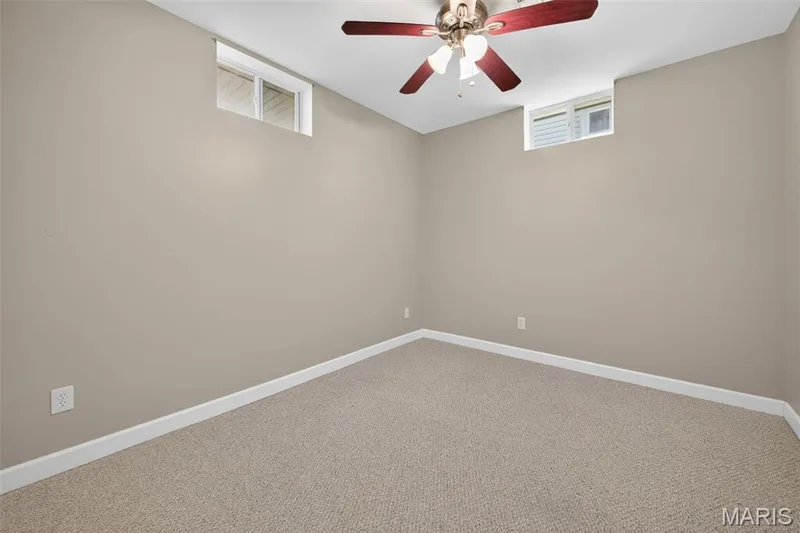 Private sleeping area in the lower level which could also be used for guest bedroom, hobbies, or a workout room — 216 Woodland Place Court, St Charles, MO 63303