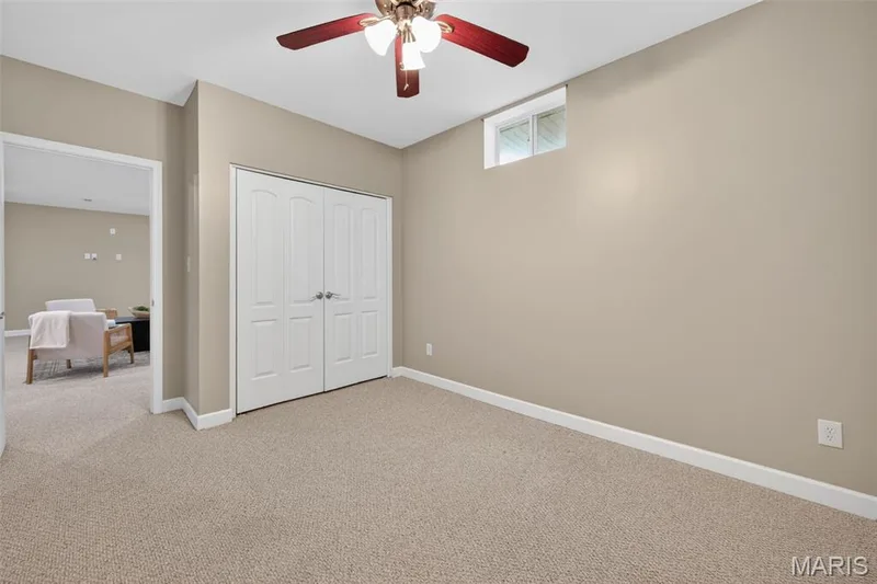 Additional private sleeping area with closet in the lower level — 216 Woodland Place Court, St Charles, MO 63303