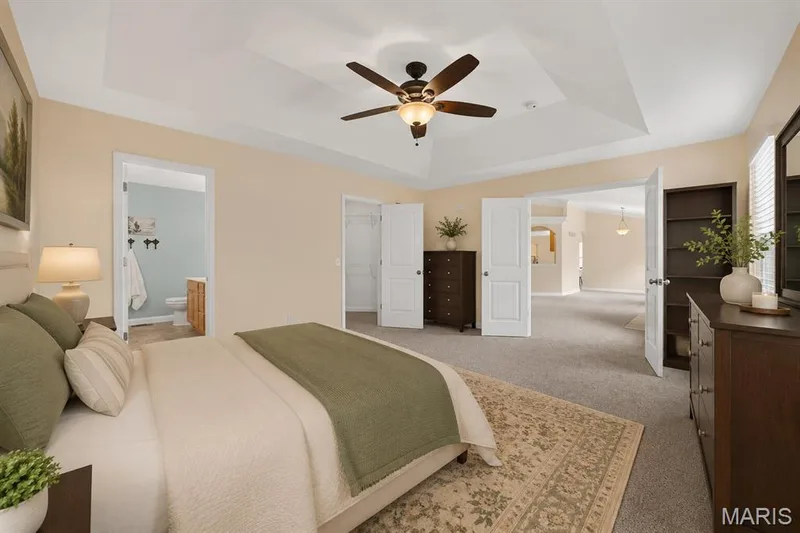 Virtually staged primary bedroom. — 4216 Broken Rock Drive, Wentzville, MO 63385