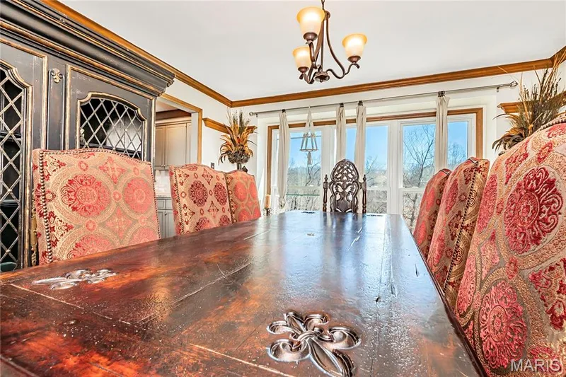 Crown molding and custom trim, lots of windows, make this a lovely space to entertain guests. — 4600 Cliff Forest Drive, Wildwood, MO 63069