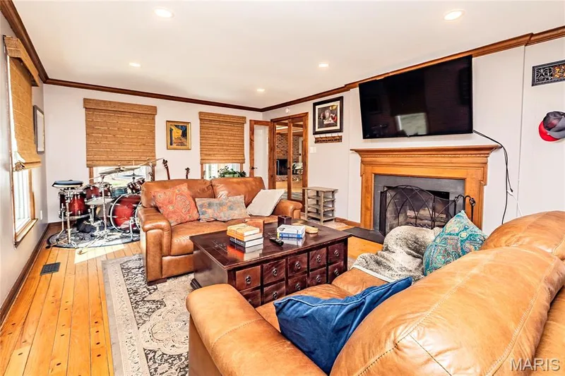 Another Woodburning Fireplace, with a TV mount above it. — 4600 Cliff Forest Drive, Wildwood, MO 63069