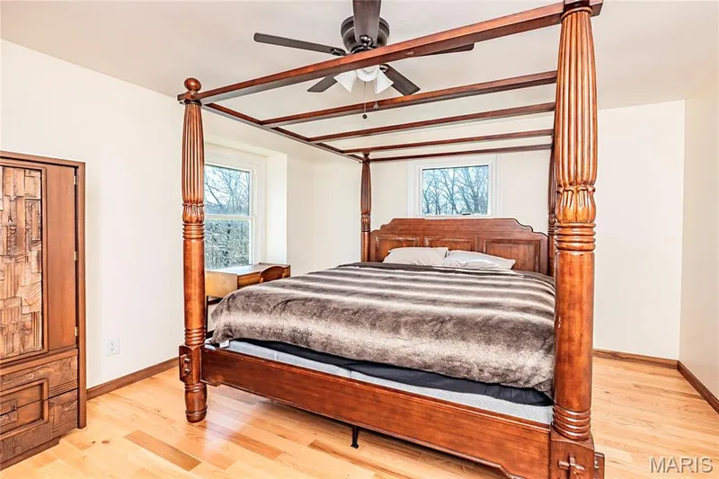 Fourth Bedroom Upstairs, amenities include, Wood Flooring, freshly painted Walls and a Ceiling Fan. — 4600 Cliff Forest Drive, Wildwood, MO 63069