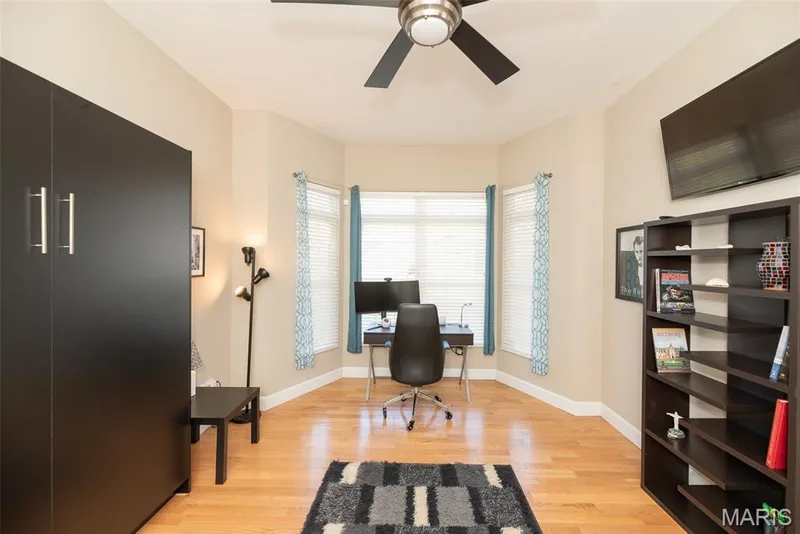 main floor office / bedroom with built in Murphy Bed — 197 Woodland Place Court, St Charles, MO 63303