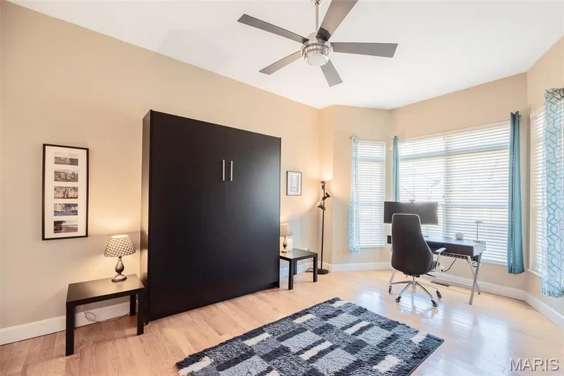 main floor office / bedroom with built in Murphy Bed — 197 Woodland Place Court, St Charles, MO 63303