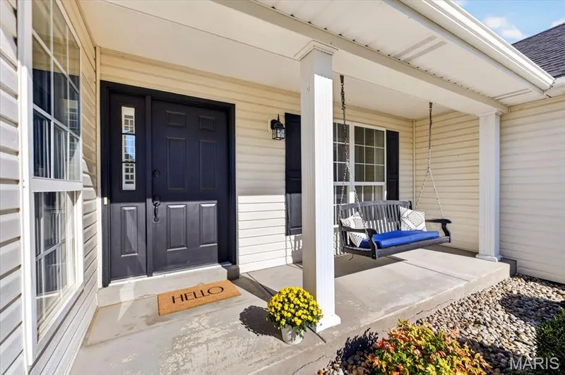 A charming front porch made for morning coffee and evening conversations — 2707 Post Meadows Drive, O'Fallon, MO 63368