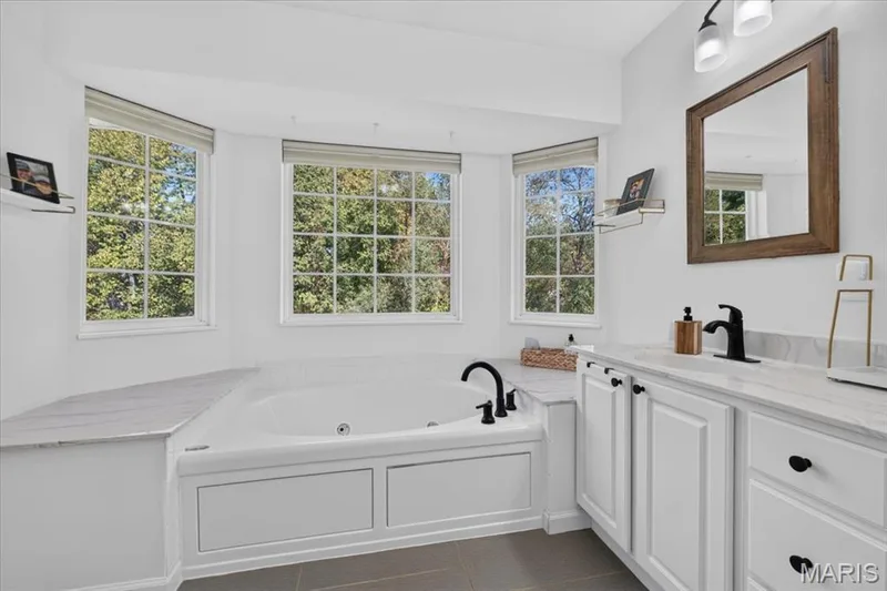 A deep soaking tub invites you to slow down and relax — 2707 Post Meadows Drive, O'Fallon, MO 63368