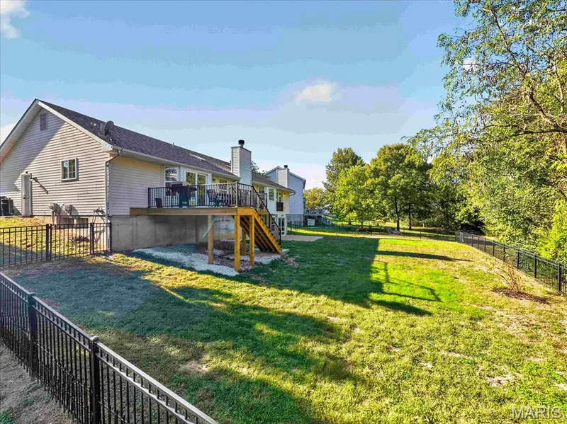 Sunset views, privacy, and plenty of room to gather, this backyard checks all the boxes — 2707 Post Meadows Drive, O'Fallon, MO 63368