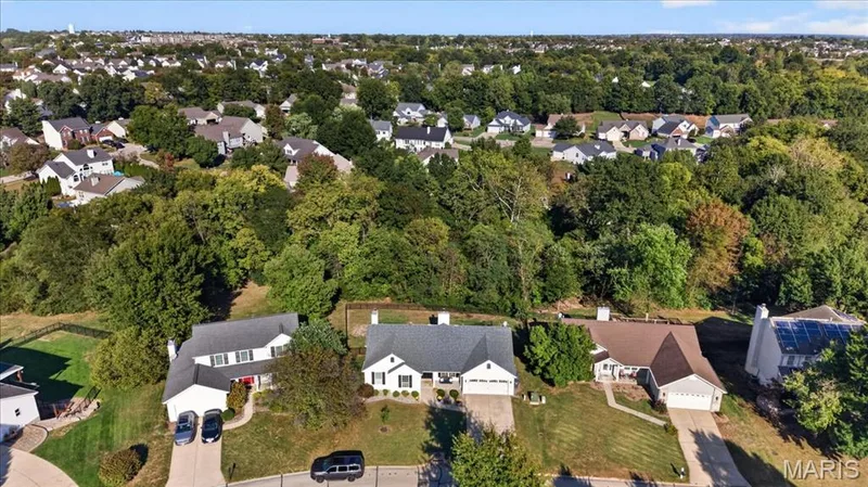 Backing to wooded common ground for added privacy — 2707 Post Meadows Drive, O'Fallon, MO 63368