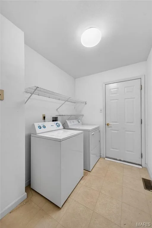 Plenty of space in the Main Floor Laundry Room! — 12 Shimmering Lake Court, St Charles, MO 63301