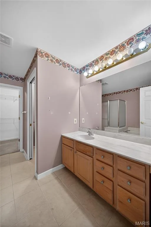 Owners Bath Suite with Oversized Wood Vanity & Private Toilet Room! — 12 Shimmering Lake Court, St Charles, MO 63301