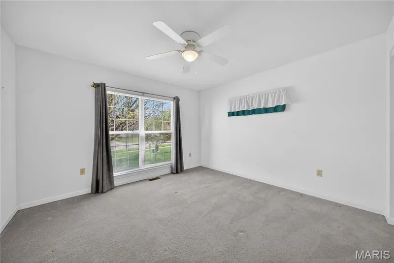 Second Bedroom located at the Front of the Home with Ceiling Fan & Light! — 12 Shimmering Lake Court, St Charles, MO 63301