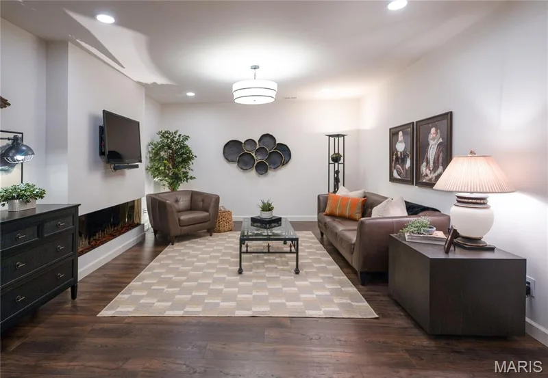 Linear fireplace and cozy family room — 150 Delcreek Estates Drive, Foristell, MO 63348