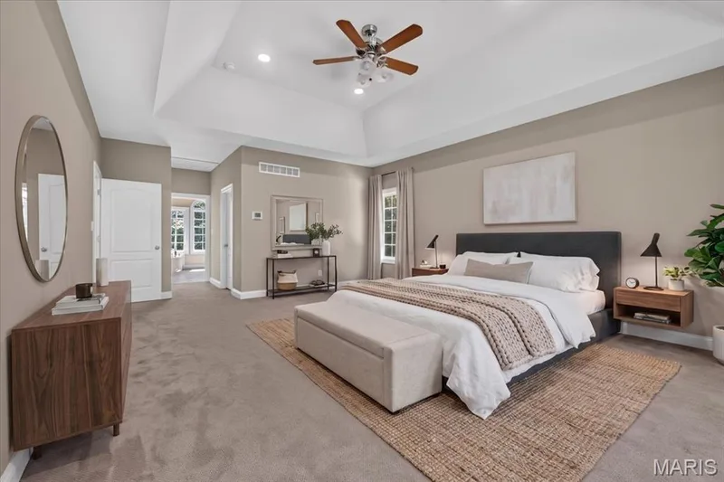 Spacious primary with a tray ceiling and walk-in closet — 18517 Gredan Court, Wildwood, MO 63069