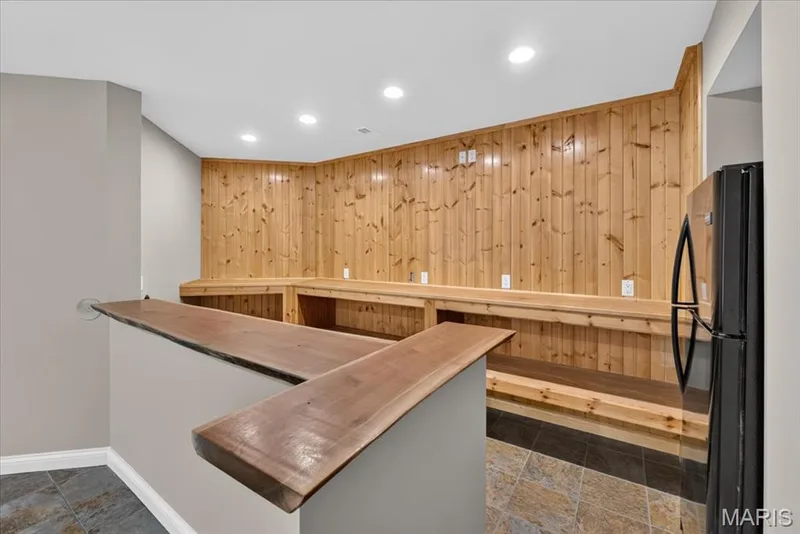 Wood bar with a natural edge top! — 18517 Gredan Court, Wildwood, MO 63069