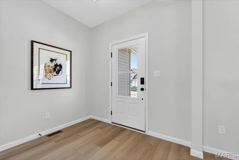 Entrance foyer with view of front door — 30 River Wind Drive, St Charles, MO 63301