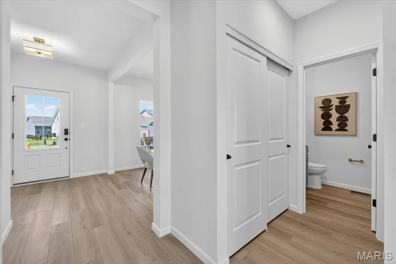 View of foyer and hall bathroom — 30 River Wind Drive, St Charles, MO 63301