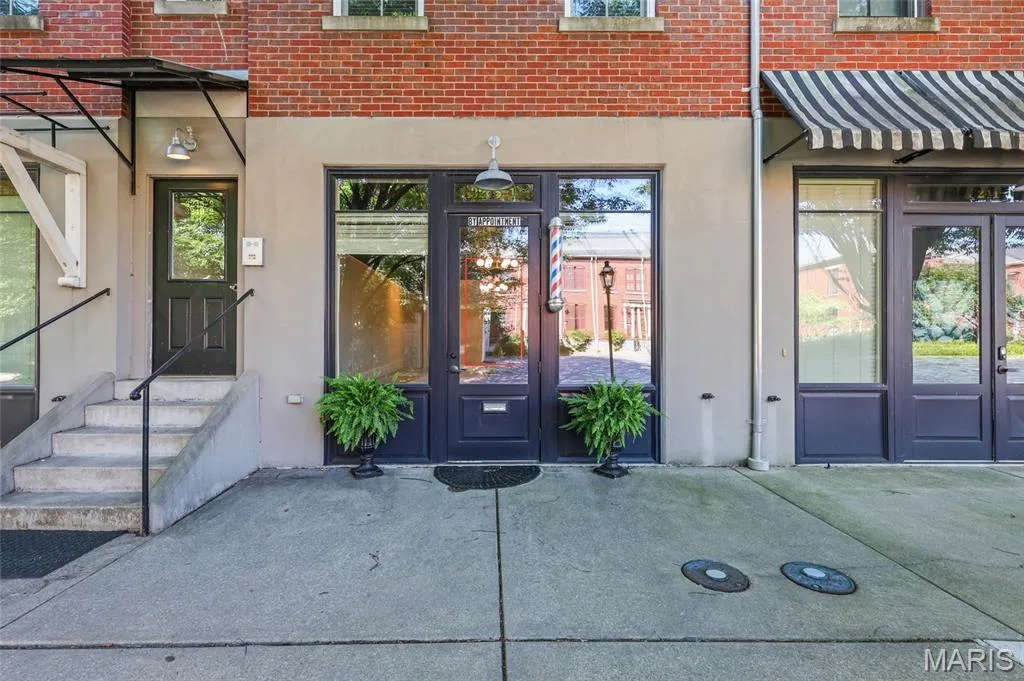 Brick facade with stucco accents and multiple storefront entries — 3245 Domain Street, St Charles, MO 63301