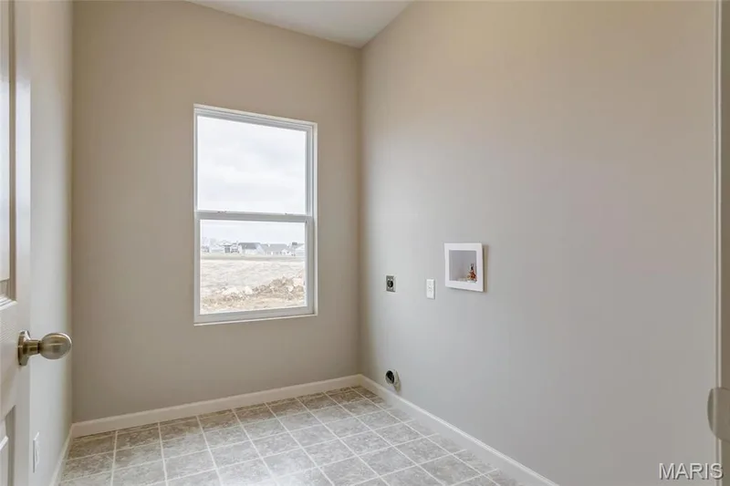 Spacious laundry room with ample light. — 0 Sheridan @ Harvest, O'Fallon, MO 63385