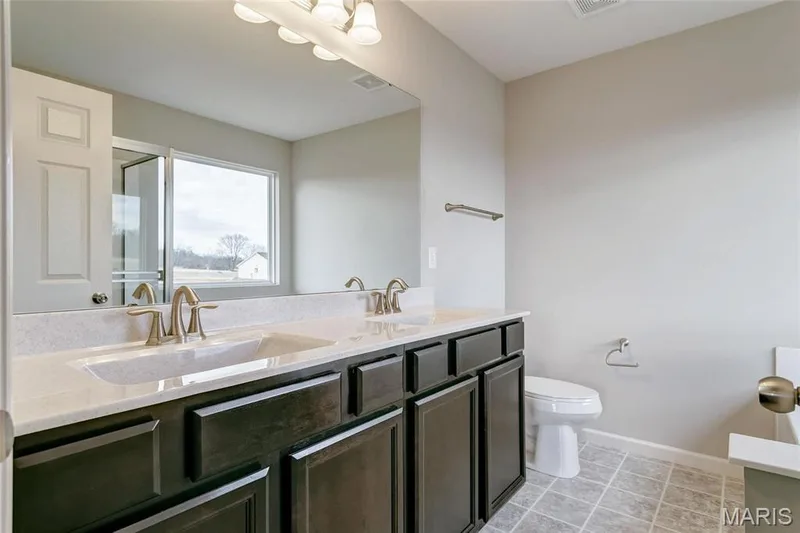 Primary Bathroom with double vanities. — 0 Sheridan @ Harvest, O'Fallon, MO 63385