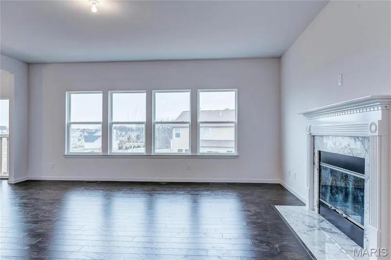 Great Room windows flooding the area with natural light. — 0 Stamford @ Harvest, O'Fallon, MO 63385