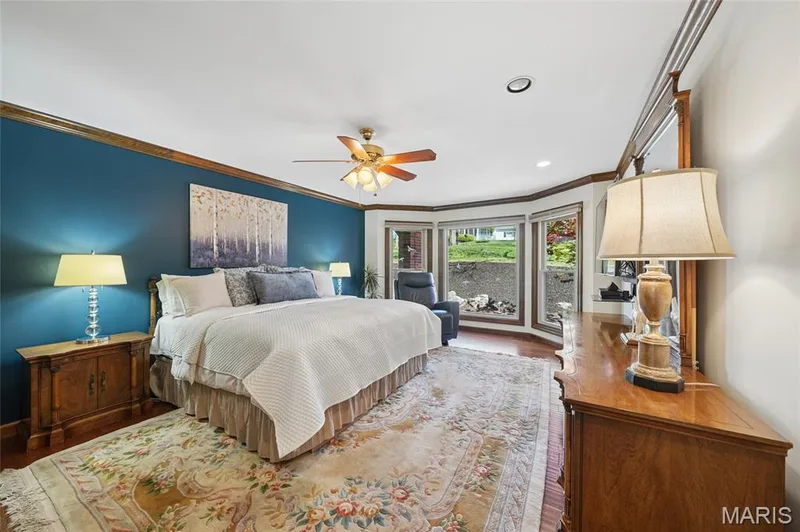 Bedroom with wood finished floors, a ceiling fan, ornamental molding, and recessed lighting — 1553 Ridge Road, Wildwood, MO 63021