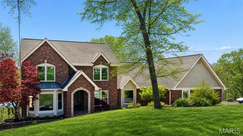 Brick and siding exterior with gabled roof lines — 1553 Ridge Road, Wildwood, MO 63021
