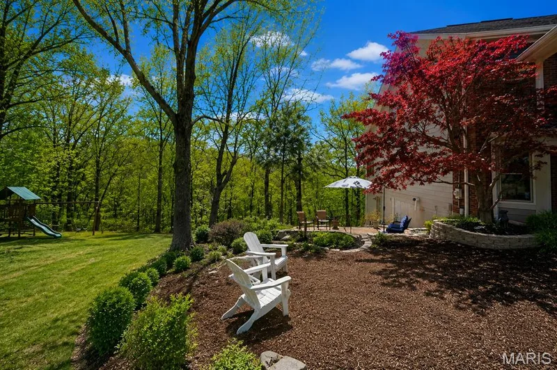 This is a virtual rendering of the side yard - possible conversion off the existing patio — 1553 Ridge Road, Wildwood, MO 63021