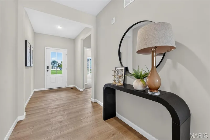 View of foyer from hallway. — 106 River Wind Drive, St Charles, MO 63301