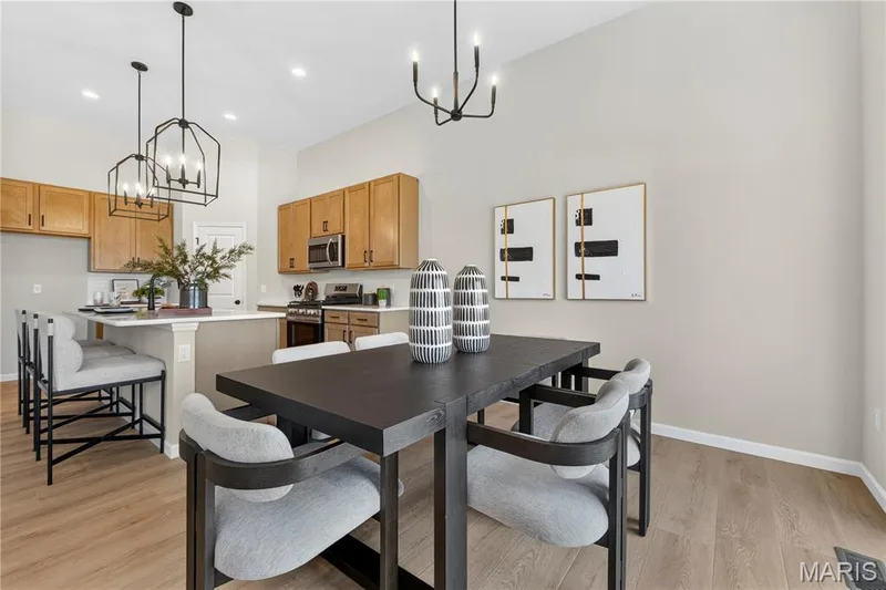 Breakfast area with view of kitchen. — 106 River Wind Drive, St Charles, MO 63301