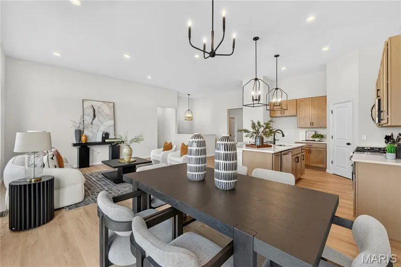 Breakfast area with view of Great room and Kitchen. — 106 River Wind Drive, St Charles, MO 63301