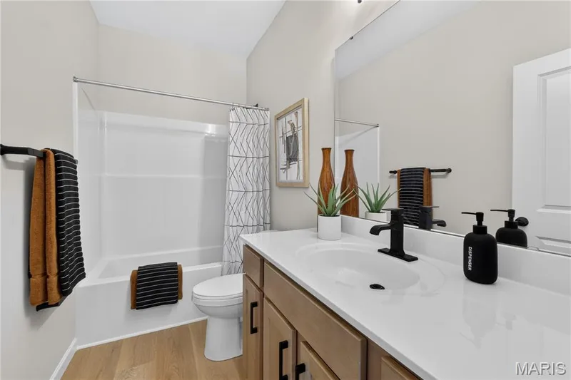 Hall bathroom. — 106 River Wind Drive, St Charles, MO 63301