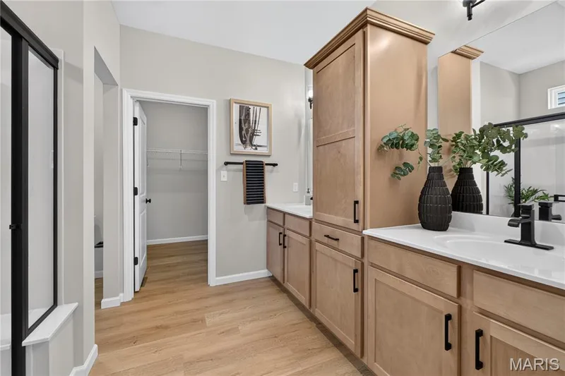 View of Primary bathroom and walk-in closet. — 106 River Wind Drive, St Charles, MO 63301