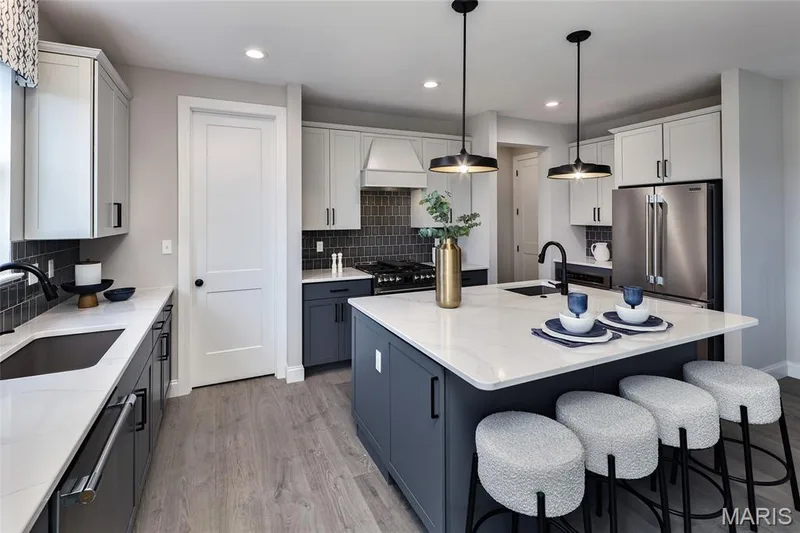Gourment Kitchen with custom cabinets, optional island with sink, Stainless steel gas appliances and two-tone cabinets — 342 Healthy Way, St Charles, MO 63304