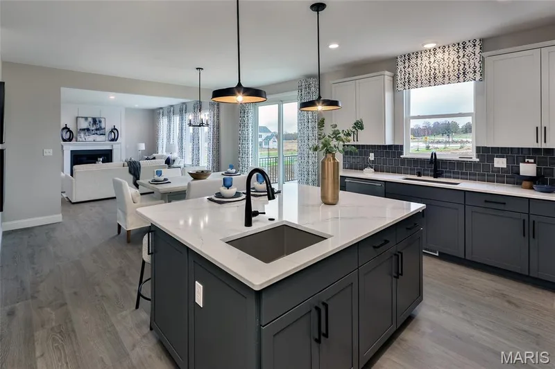 Gourment Kitchen with custom cabinets, optional island with sink, Stainless steel gas appliances and two-tone cabinets — 342 Healthy Way, St Charles, MO 63304