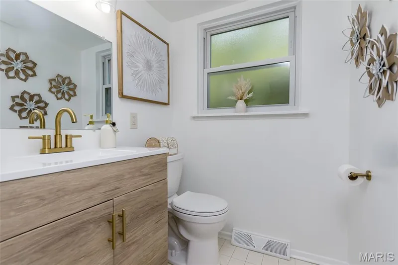 Beautifully updated powder room with new vanity and fixtures! — 250 Brixham Drive, Chesterfield, MO 63017